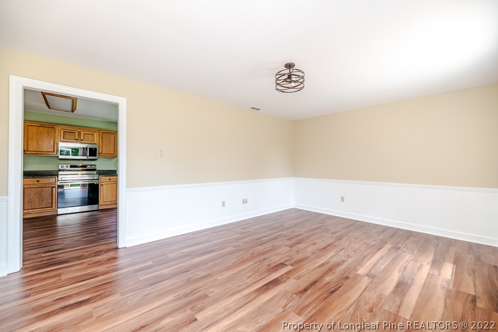 192 Cypress Road Cameron, NC 28326 - Photo 5 of 26 a view of empty room with wooden floor