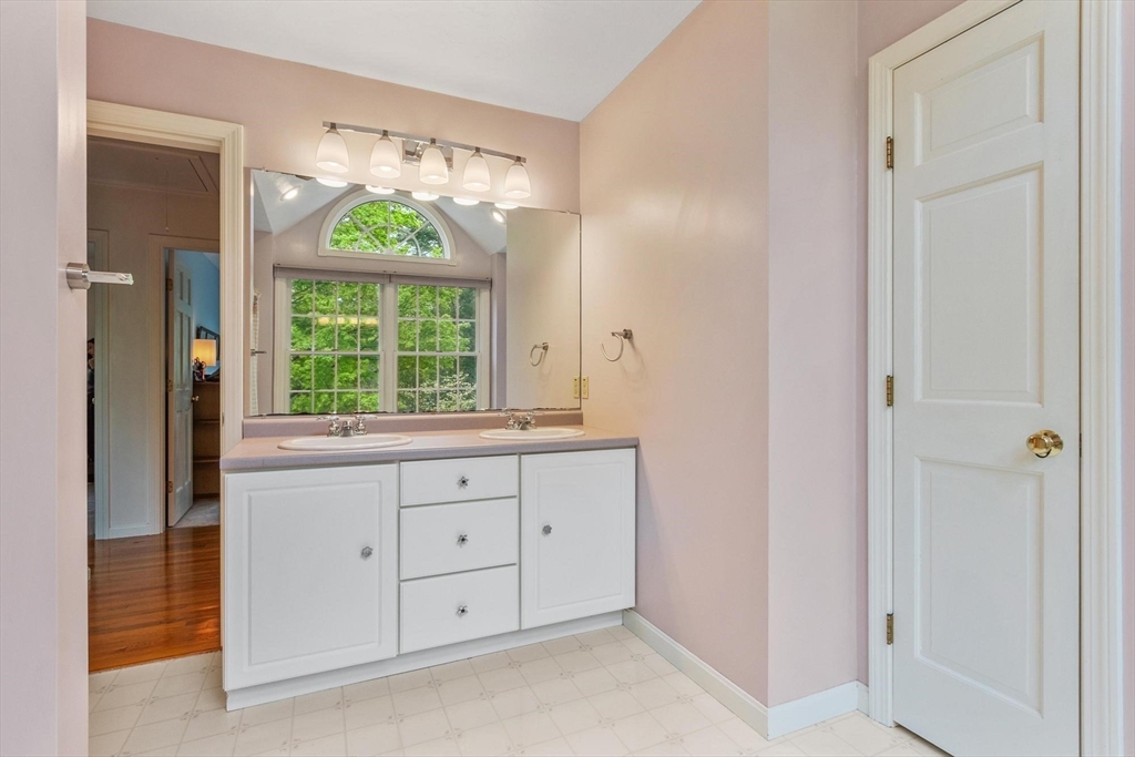 94 Turner Road Townsend, MA 01469 - Photo 28 of 42 a bathroom with a granite countertop sink and a window