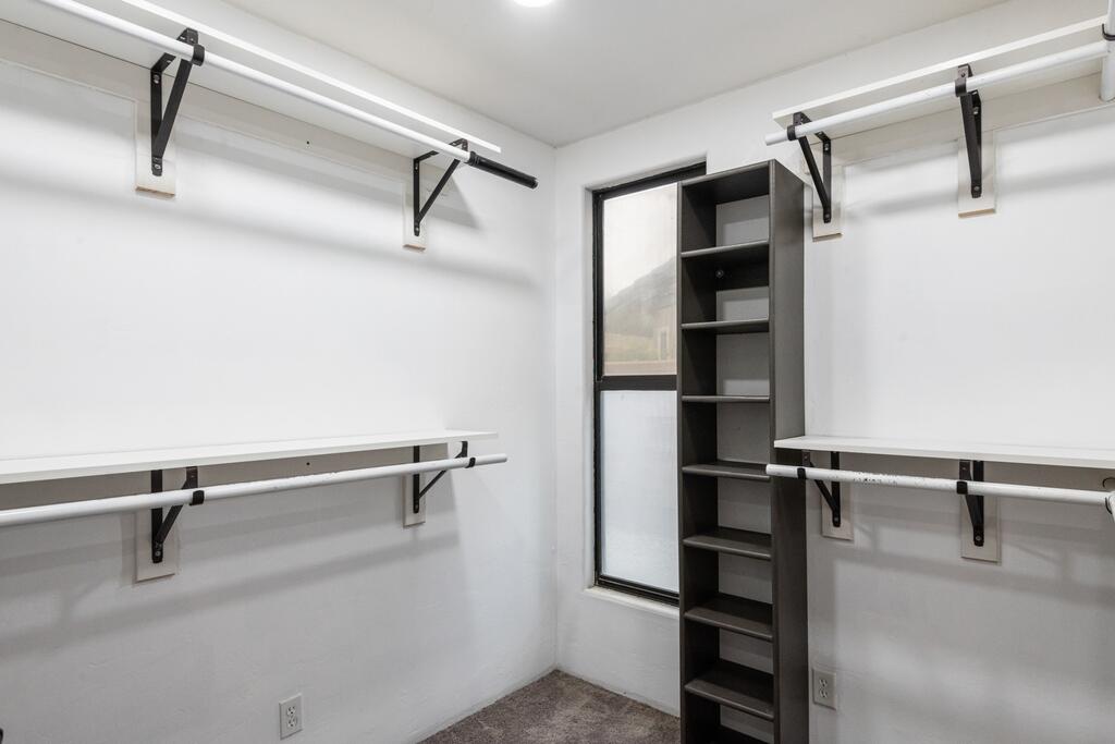 67425 Medano Road Cathedral City, CA 92234 - Photo 11 of 17 a view of a room with racks on the wall