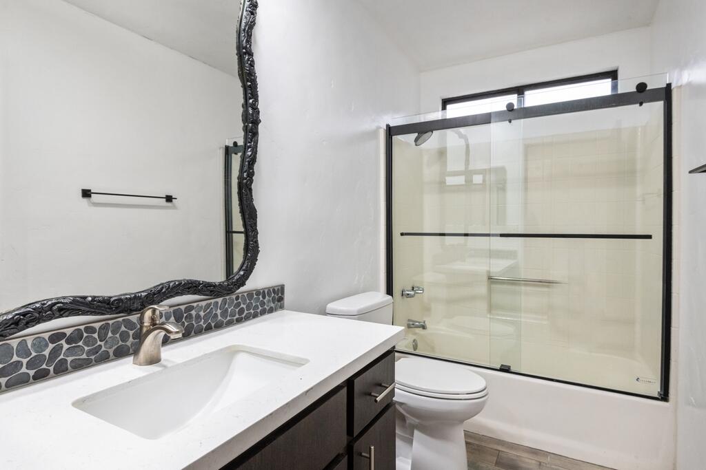 67425 Medano Road Cathedral City, CA 92234 - Photo 13 of 17 a bathroom with a sink toilet and shower