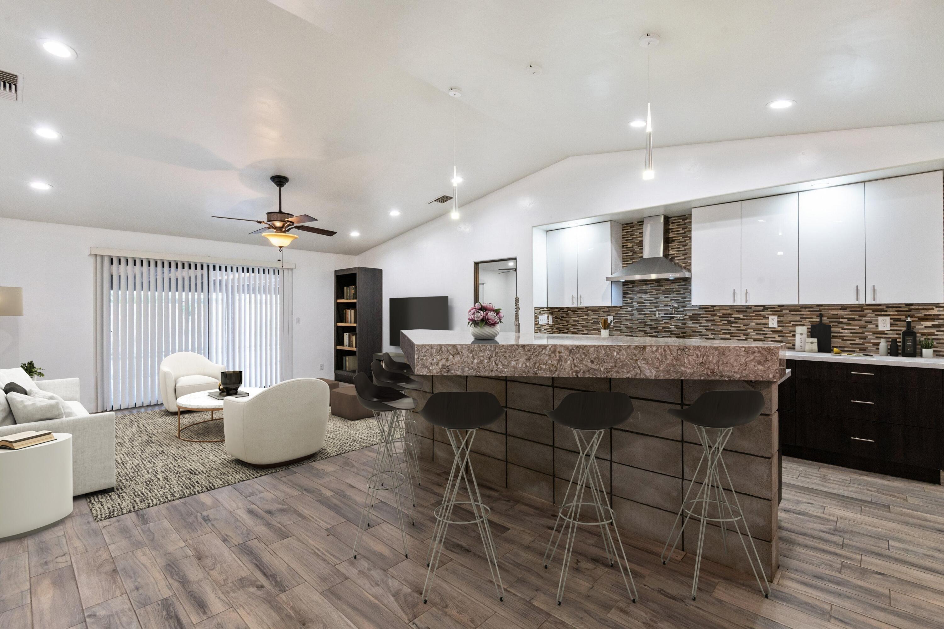 67425 Medano Road Cathedral City, CA 92234 - Photo 3 of 17 a large kitchen with a table and chairs