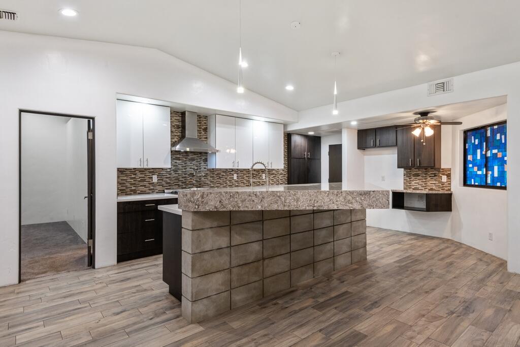 67425 Medano Road Cathedral City, CA 92234 - Photo 4 of 17 a large bathroom with a large mirror and double vanity