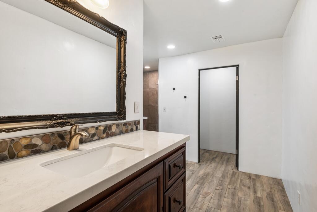 67425 Medano Road Cathedral City, CA 92234 - Photo 9 of 17 a bathroom with a sink and a mirror
