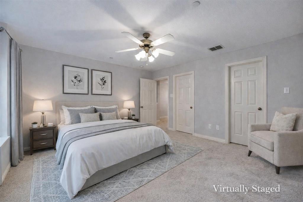2320 Durango Ridge Drive Bedford, TX 76021 - Photo 14 of 21 a spacious bedroom with a bed and a couch