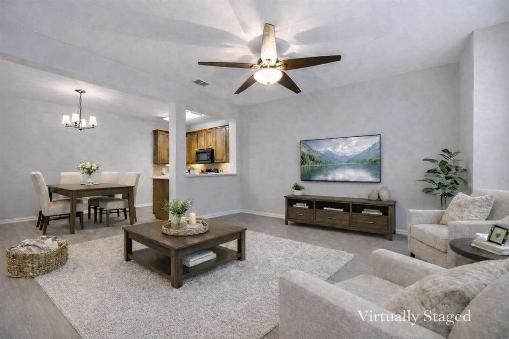2320 Durango Ridge Drive Bedford, TX 76021 - Photo 4 of 21 a living room with furniture and a flat screen tv