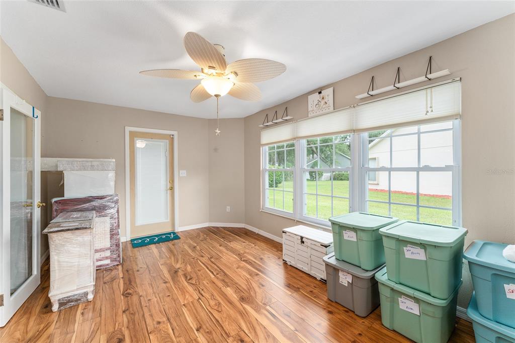 2121 Vindale Road Tavares, FL 32778 - Photo 18 of 37 a very nice looking room with a large window