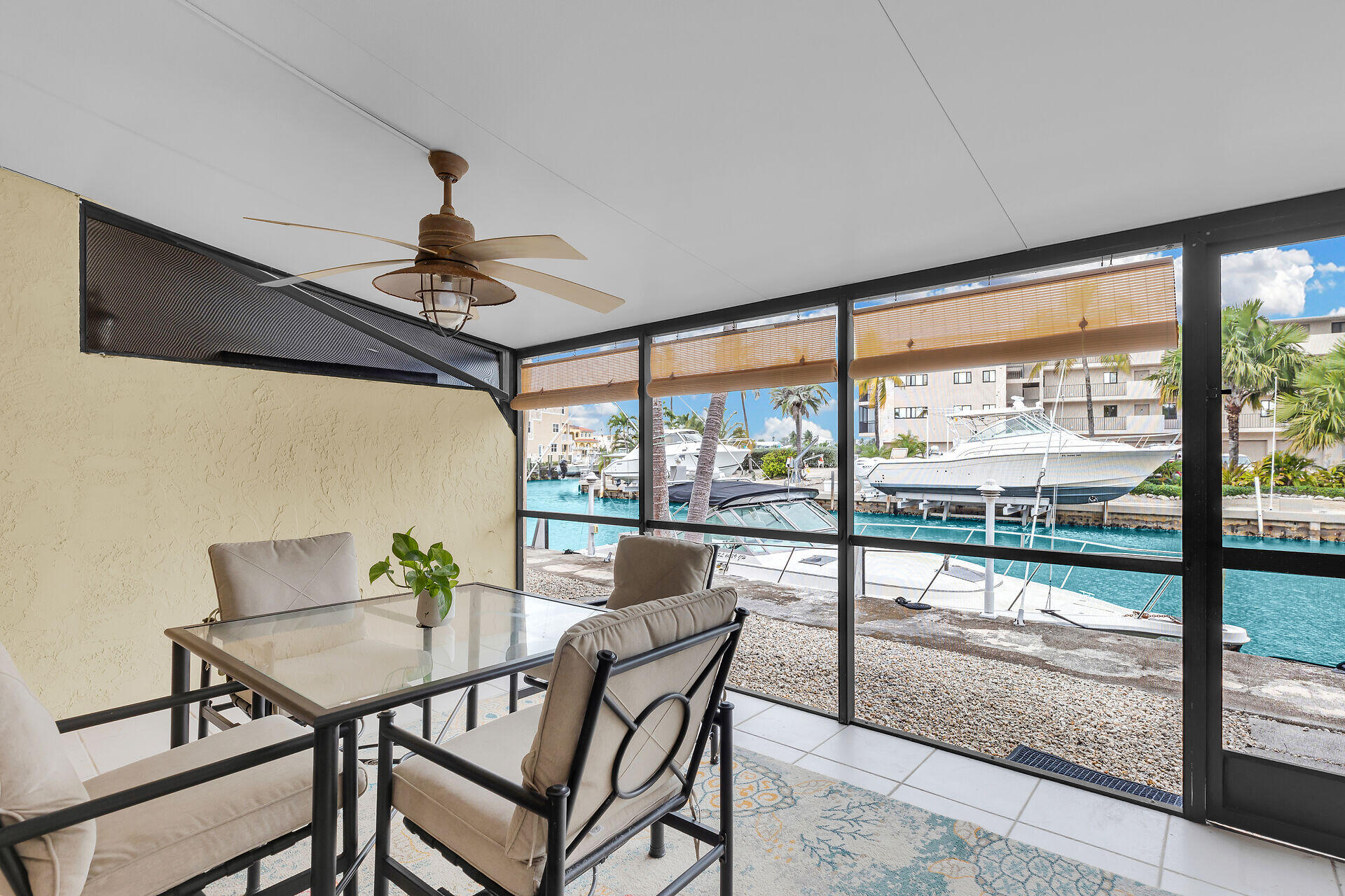 423 Sombrero Beach Road, Unit 9 Marathon, FL 33050 - Photo 4 of 42 Screened Patio with Canal Views