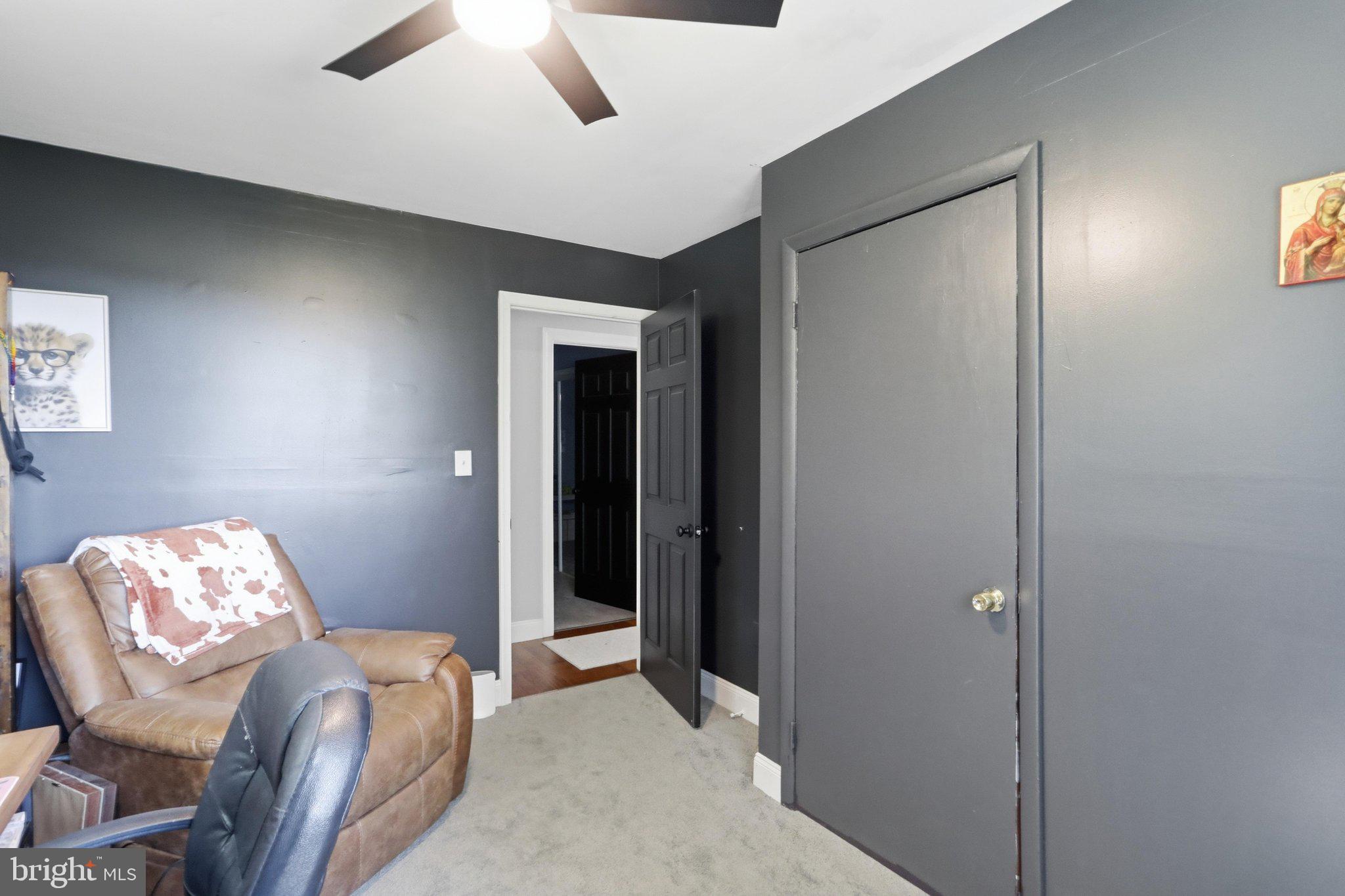 120 Motorcycle Lane Ridgeley, WV 26753 - Photo 26 of 34 a room that has a bed and a chair in it