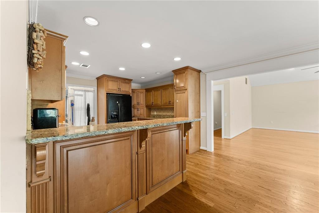 749 Hubert Pittman Road Pendergrass, GA 30567 - Photo 14 of 49 a kitchen with stainless steel appliances granite countertop a refrigerator and a stove top oven