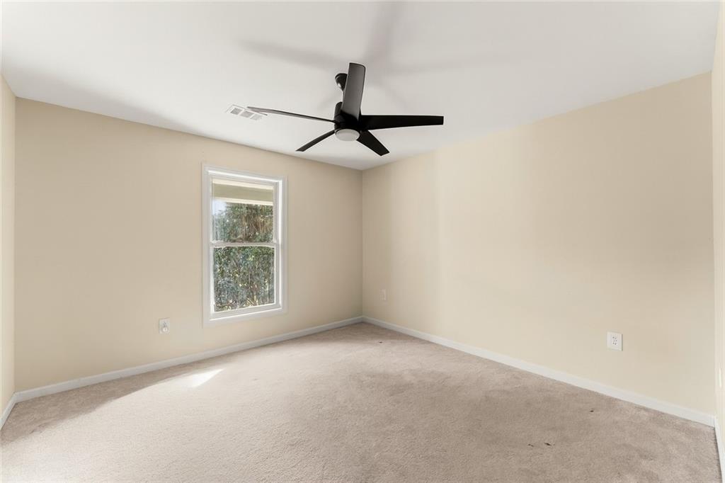 749 Hubert Pittman Road Pendergrass, GA 30567 - Photo 25 of 49 a view of an empty room with a window