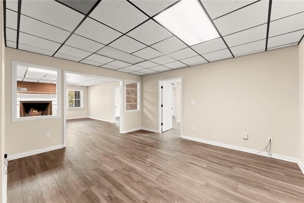 749 Hubert Pittman Road Pendergrass, GA 30567 - Photo 31 of 49 a view of empty room with wooden floor and cabinet