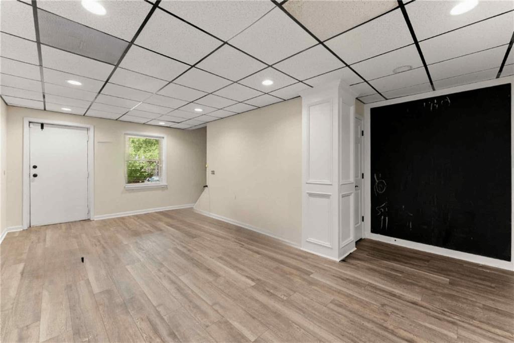 749 Hubert Pittman Road Pendergrass, GA 30567 - Photo 33 of 49 a view of empty room with wooden floor