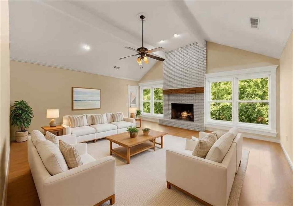 749 Hubert Pittman Road Pendergrass, GA 30567 - Photo 6 of 49 a living room with furniture fireplace and a window