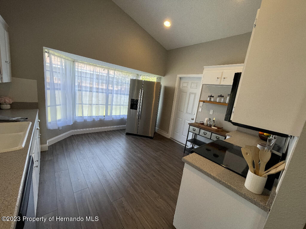 2239 Fairview Road Spring Hill, FL 34609 - Photo 4 of 25 36445_64459221208c8_04.23.2023_image-4