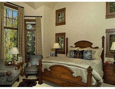 301 Eagle River Road Edwards, CO 81632 - Photo 4 of 20 a bedroom with bed and a window