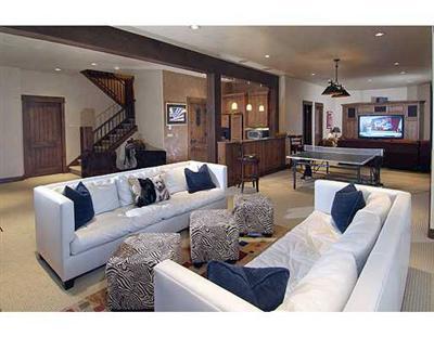 301 Eagle River Road Edwards, CO 81632 - Photo 9 of 20 a living room with furniture and a wooden floor