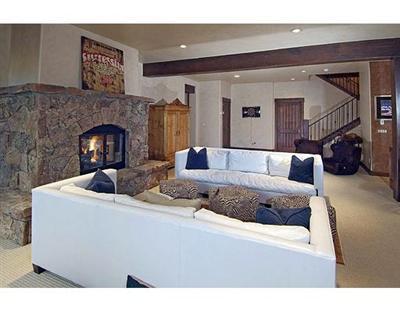 301 Eagle River Road Edwards, CO 81632 - Photo 10 of 20 a living room with furniture and a fireplace