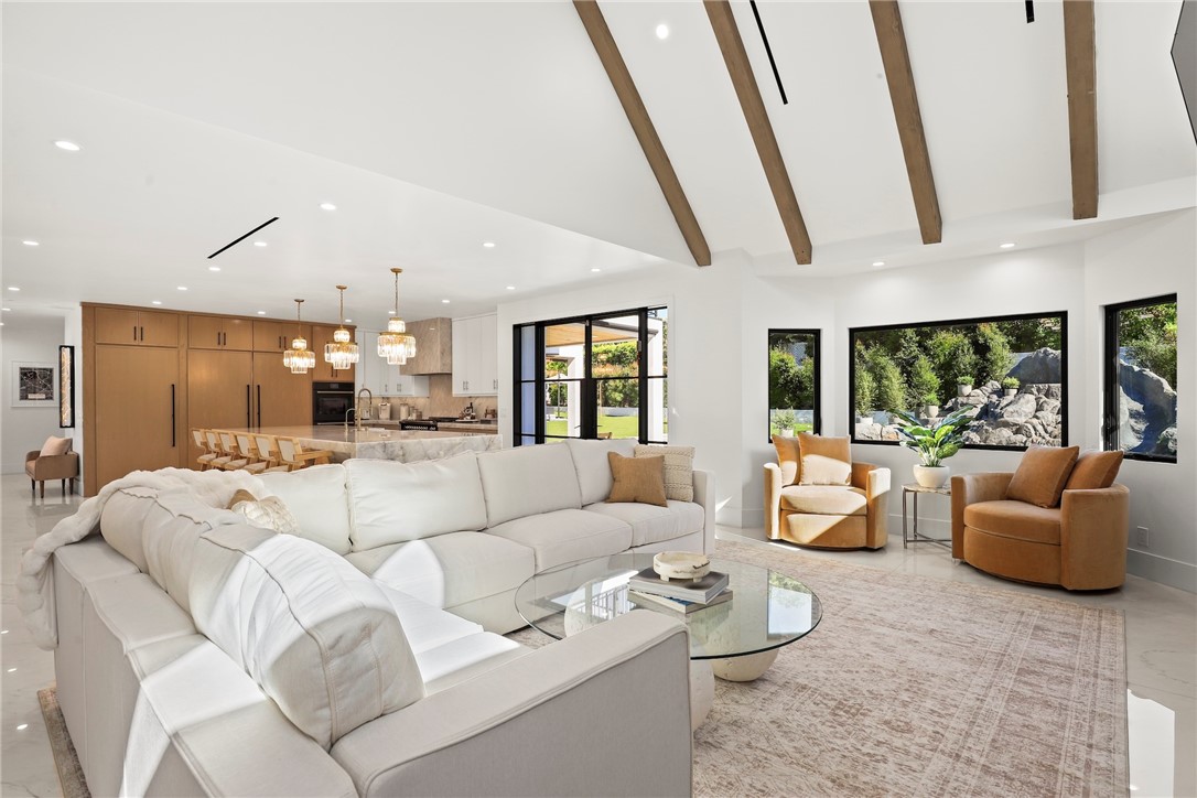 20630 Kingsboro Way Woodland Hills, CA 91364 - Photo 12 of 44 a living room with furniture and a large window