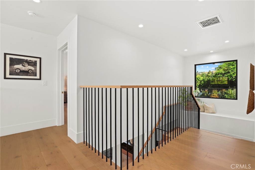 20630 Kingsboro Way Woodland Hills, CA 91364 - Photo 17 of 44 a view of a hallway with a window