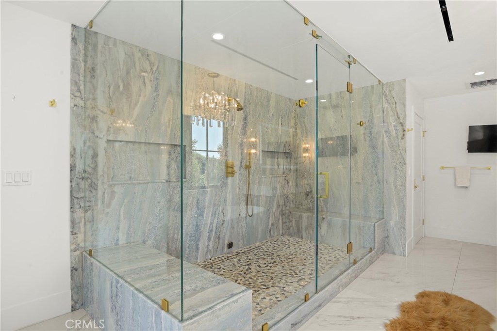 20630 Kingsboro Way Woodland Hills, CA 91364 - Photo 22 of 44 a bathroom with a shower