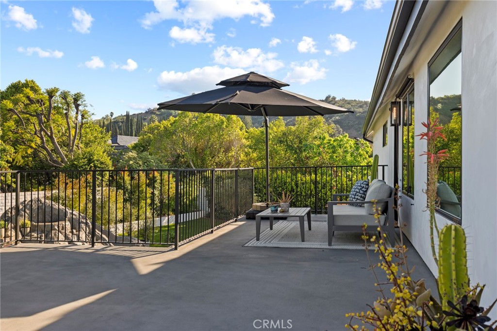 20630 Kingsboro Way Woodland Hills, CA 91364 - Photo 32 of 44 a view of an chairs and table in the balcony