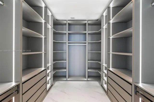 a view of empty room with windows