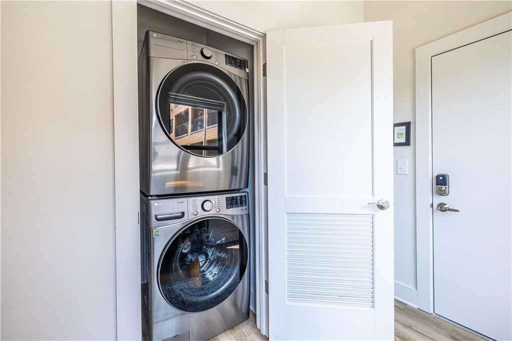 112 Rogers Street Southeast, Unit 208 Atlanta, GA 30307 - Photo 29 of 44 a utility room with dryer and washer