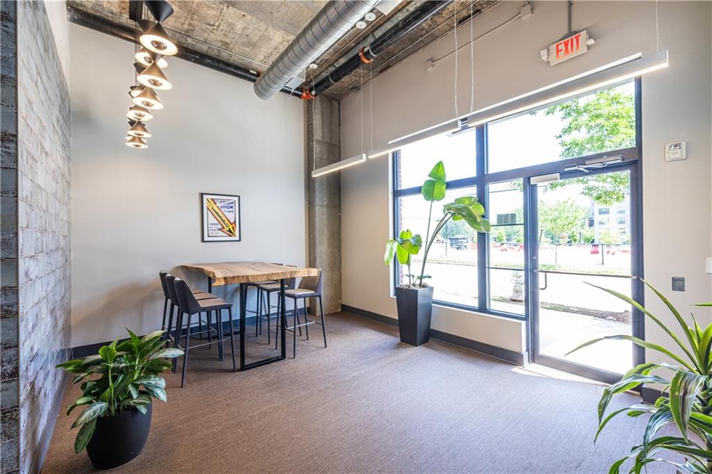 112 Rogers Street Southeast, Unit 208 Atlanta, GA 30307 - Photo 31 of 44 a view of workspace with furniture and a window
