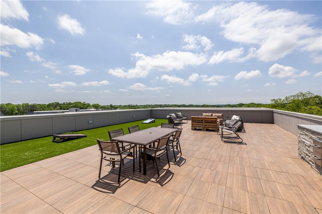 112 Rogers Street Southeast, Unit 208 Atlanta, GA 30307 - Photo 41 of 44 a view of a terrace with sitting area