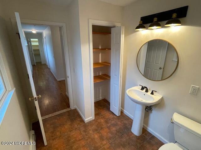 220 Folsom Drive Brick, NJ 08724 - Photo 24 of 51 a bathroom with a sink mirror and toilet