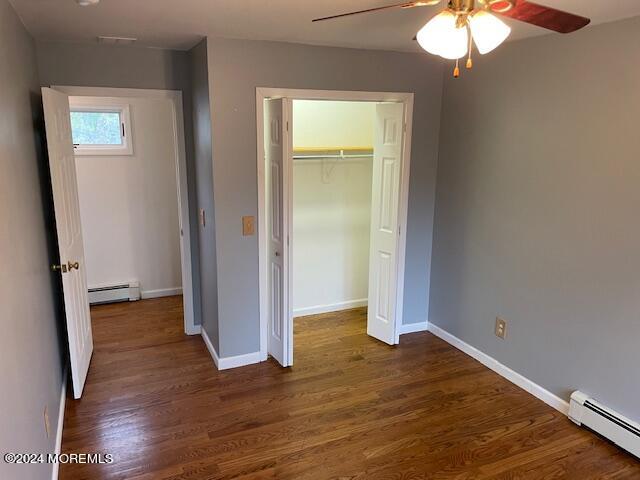 220 Folsom Drive Brick, NJ 08724 - Photo 28 of 51 an empty room with wooden floor and a window