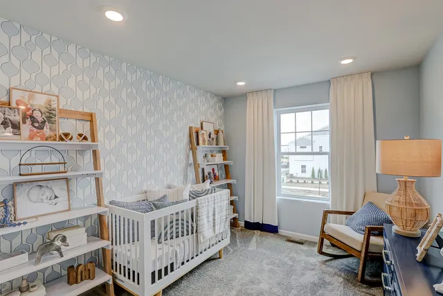 a bedroom with furniture and a window