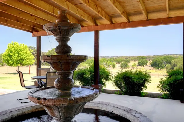 a view of a fountain in the patio
