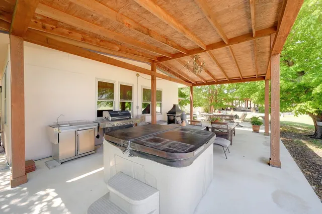 a kitchen with counter top space and furniture