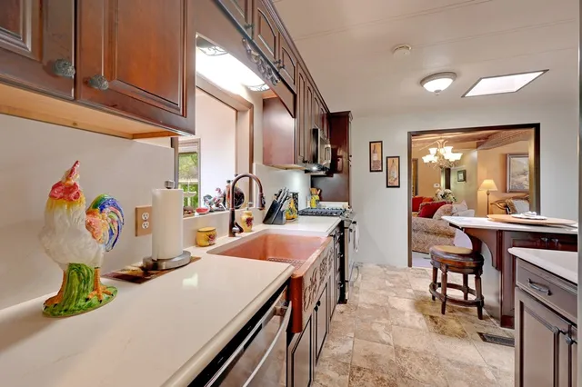 a room with furniture and a sink