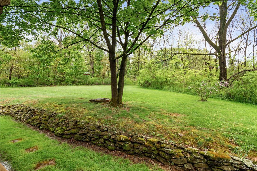 4236 Huckleberry Road Allentown, PA 18104 - Photo 11 of 39 a view of a field with a tree