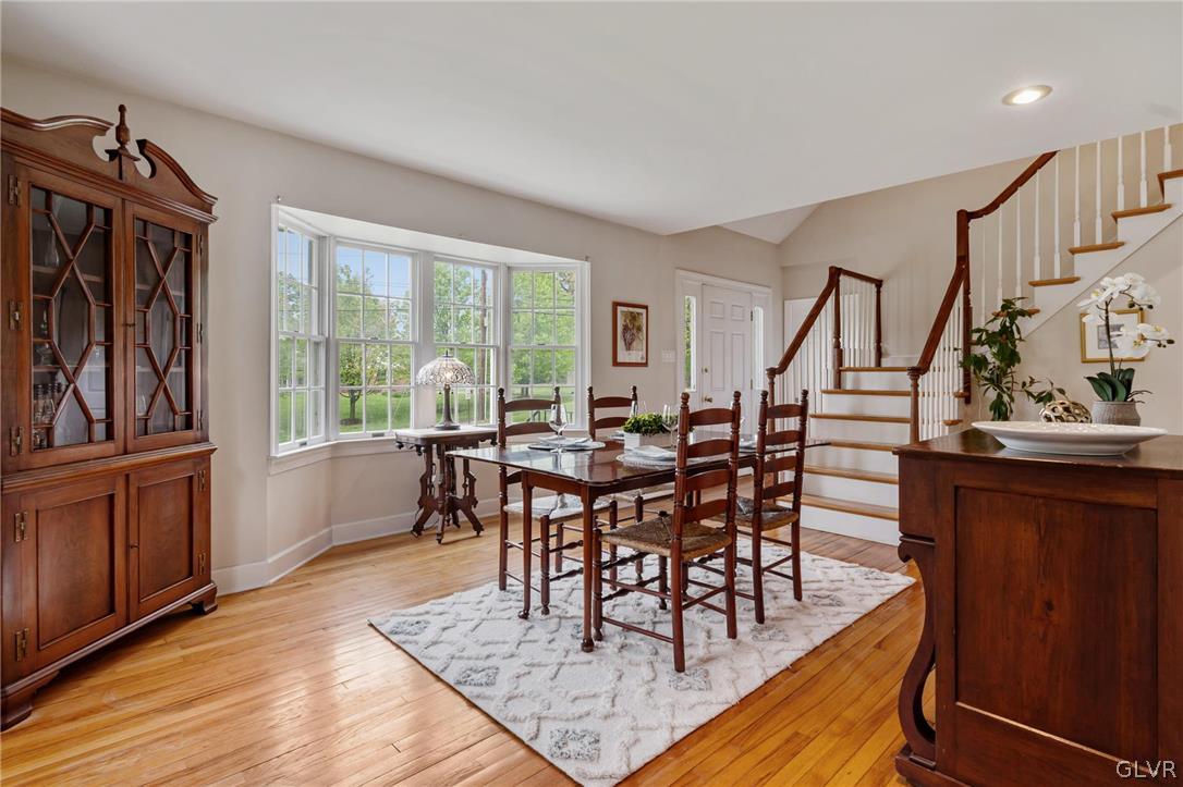 4236 Huckleberry Road Allentown, PA 18104 - Photo 13 of 39 a view of a dining room with furniture window and wooden floor