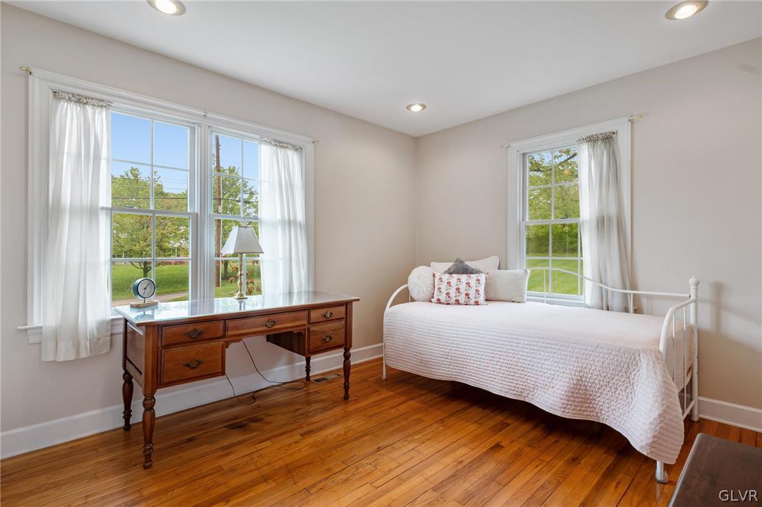 4236 Huckleberry Road Allentown, PA 18104 - Photo 26 of 39 a bed room with a bed and a chair