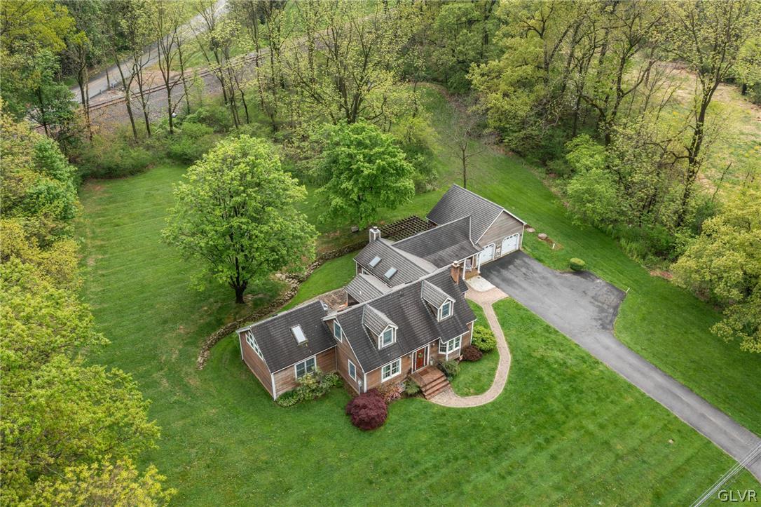 4236 Huckleberry Road Allentown, PA 18104 - Photo 4 of 39 an aerial view of a house with garden