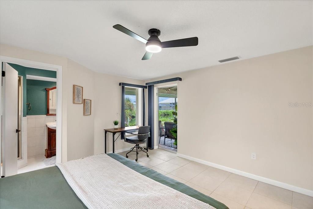 4696 Pompano Street Placida, FL 33946 - Photo 13 of 23 a living room with furniture and a window