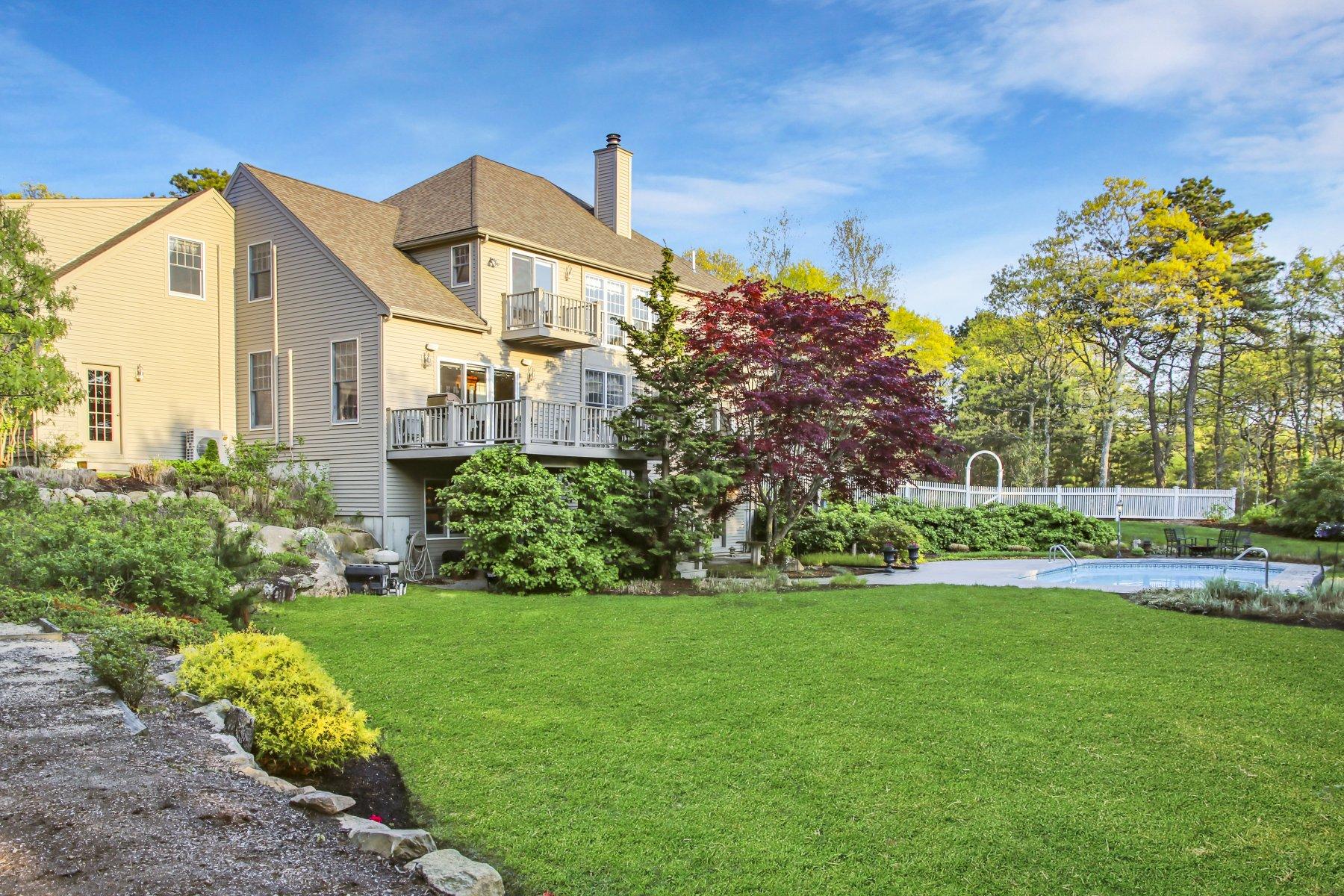 374 Cairn Ridge Road East Falmouth, MA 02536 - Photo 47 of 56 a front view of a house with a yard