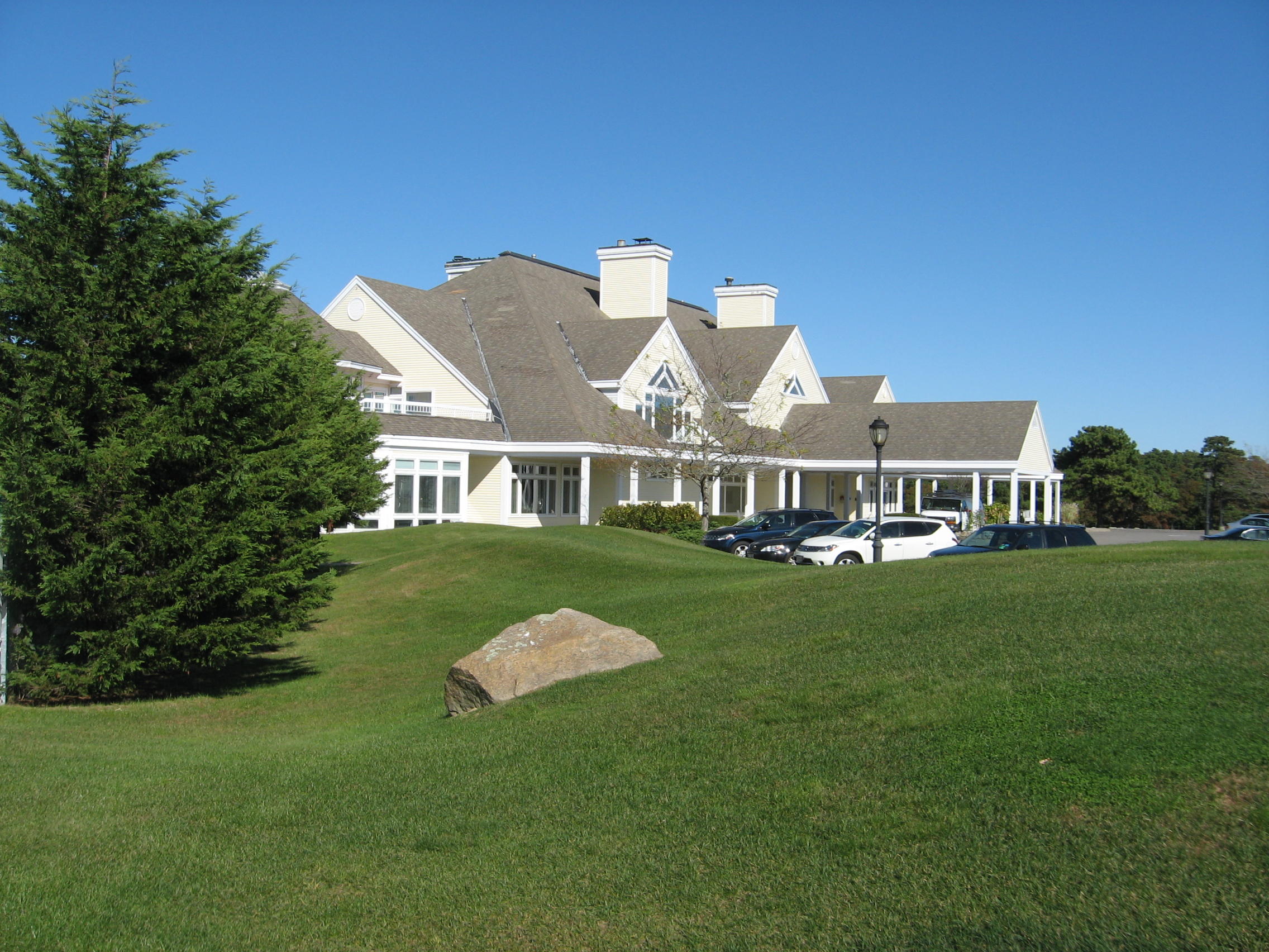 374 Cairn Ridge Road East Falmouth, MA 02536 - Photo 51 of 56 a front view of a house with garden