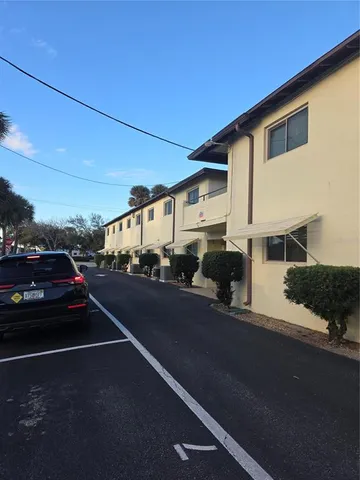 a view of a street with cars