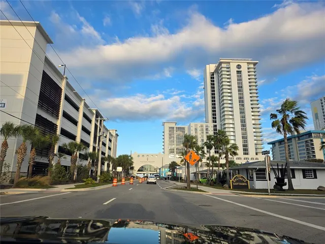 a city street lined with tall buildings