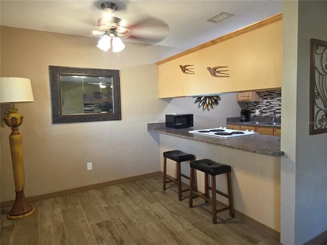 a view of workspace with a table and couch