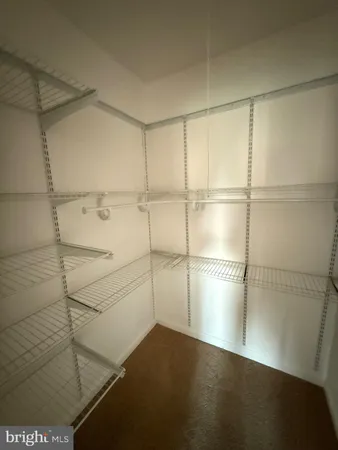 a empty room with wooden floor