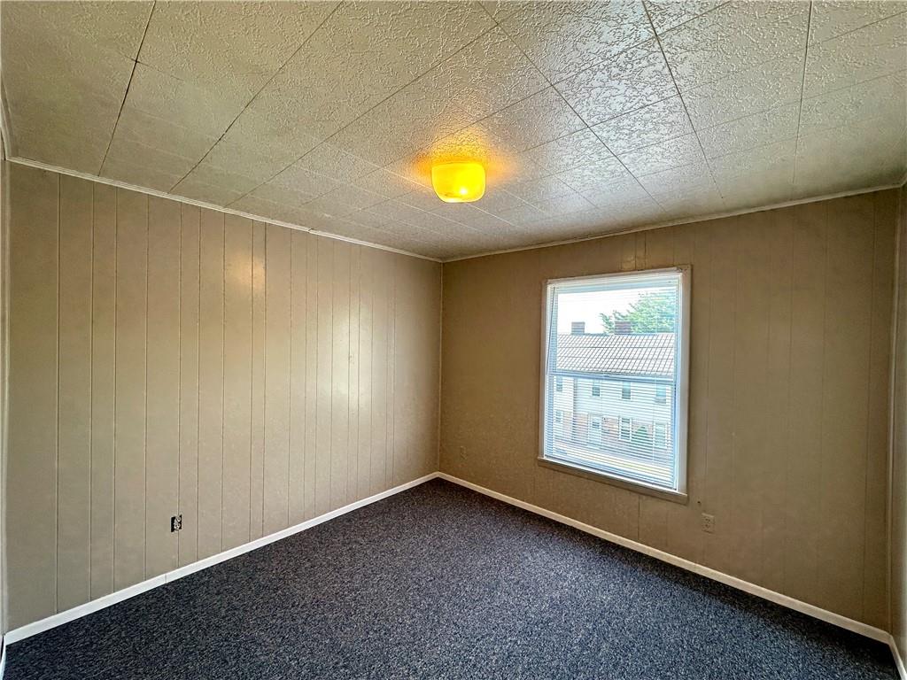 114 South Street Butler, PA 16001 - Photo 28 of 32 an empty room with windows and mirror