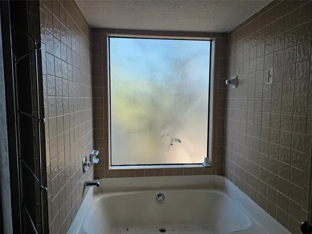 a bathroom with a bathtub