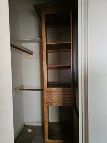 a view of walk in closet with empty space