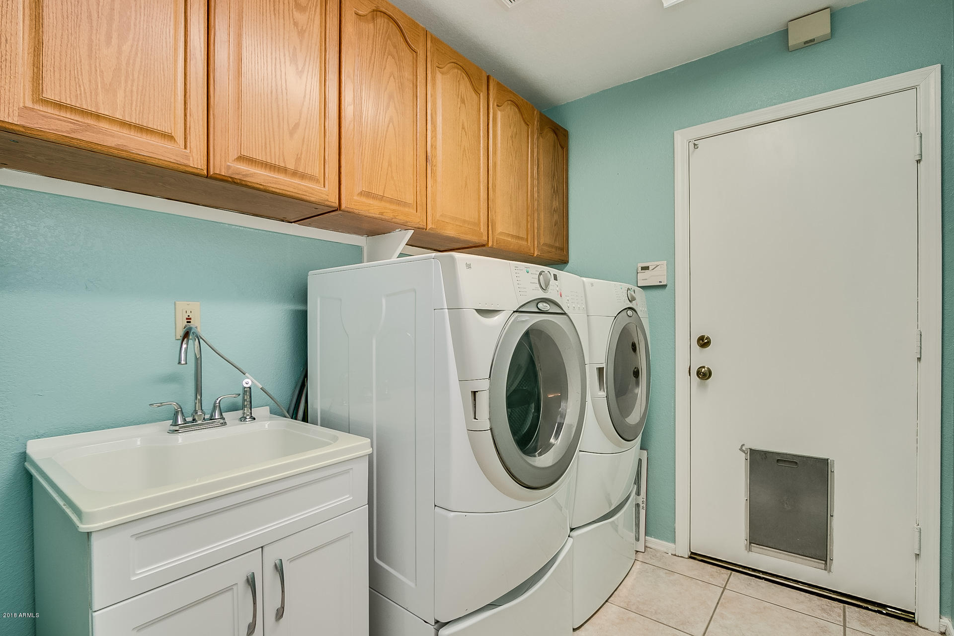 4225 East Rockledge Road Phoenix, AZ 85044 - Photo 16 of 20 Laundry with sink